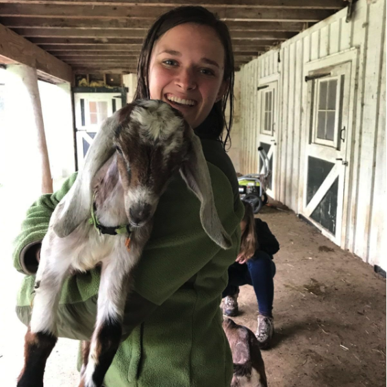 Haley holding a baby goat